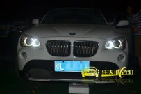 宝马X1 改装升级高配天使眼大灯总成 原厂宝马白色光导天使眼